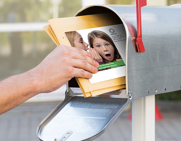 postcard in mailbox